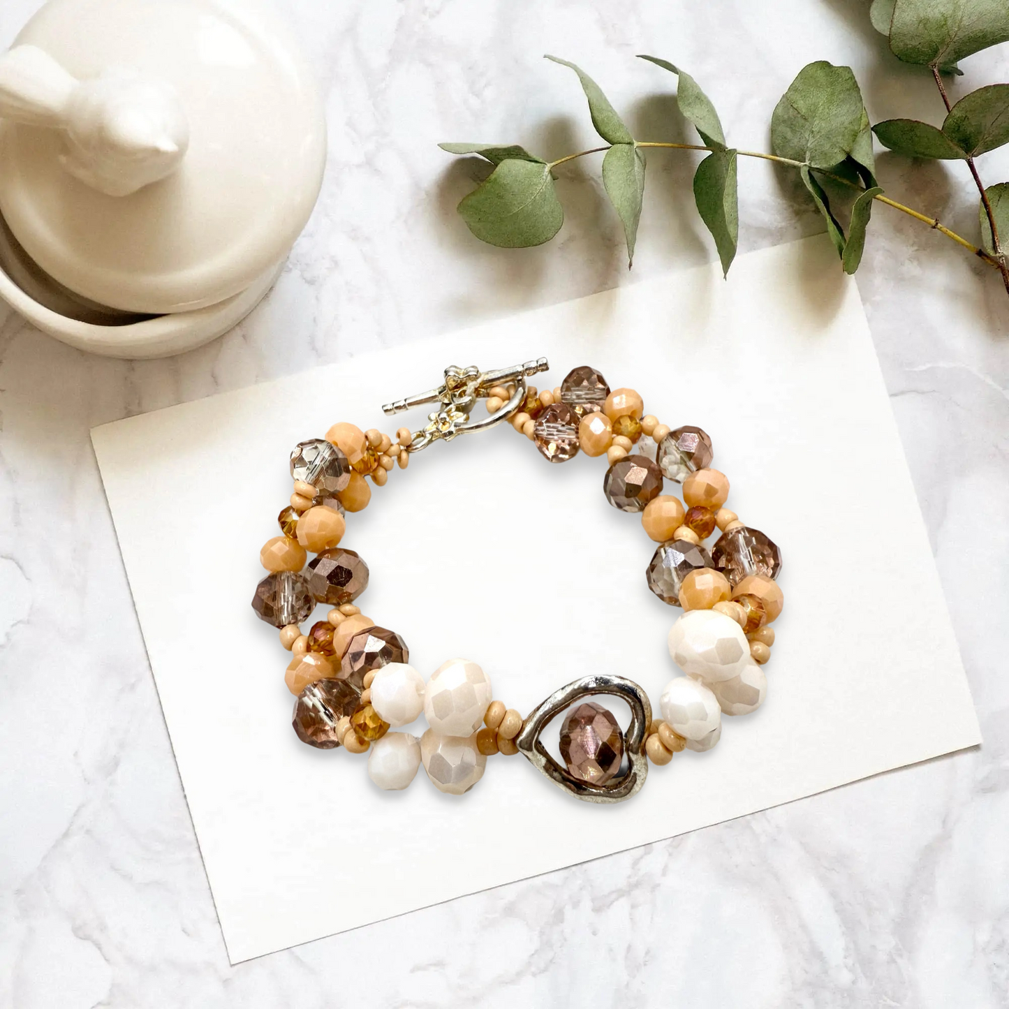 Charming nude base hearty hollow charm bracelet
