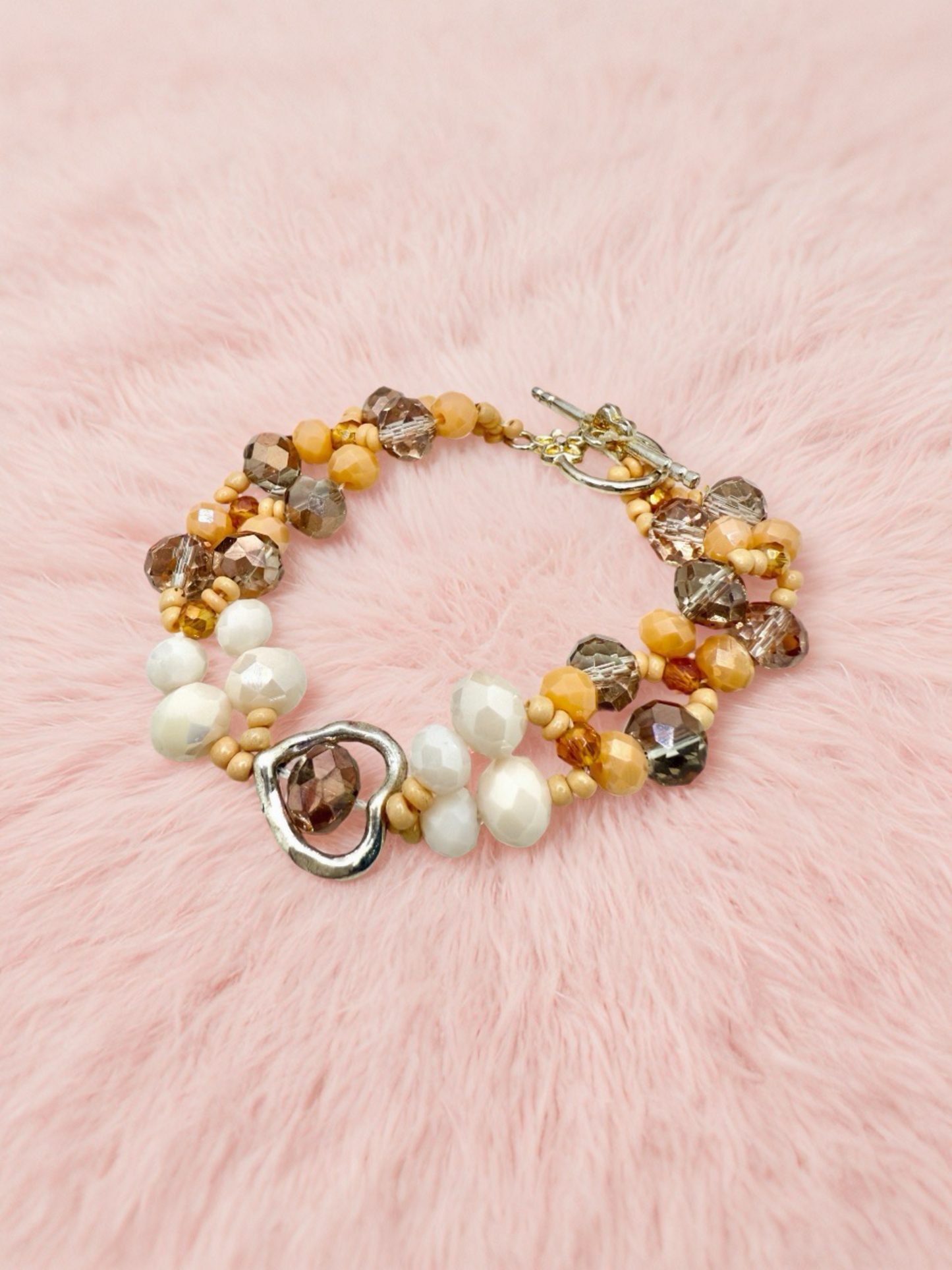 Charming nude base hearty hollow charm bracelet