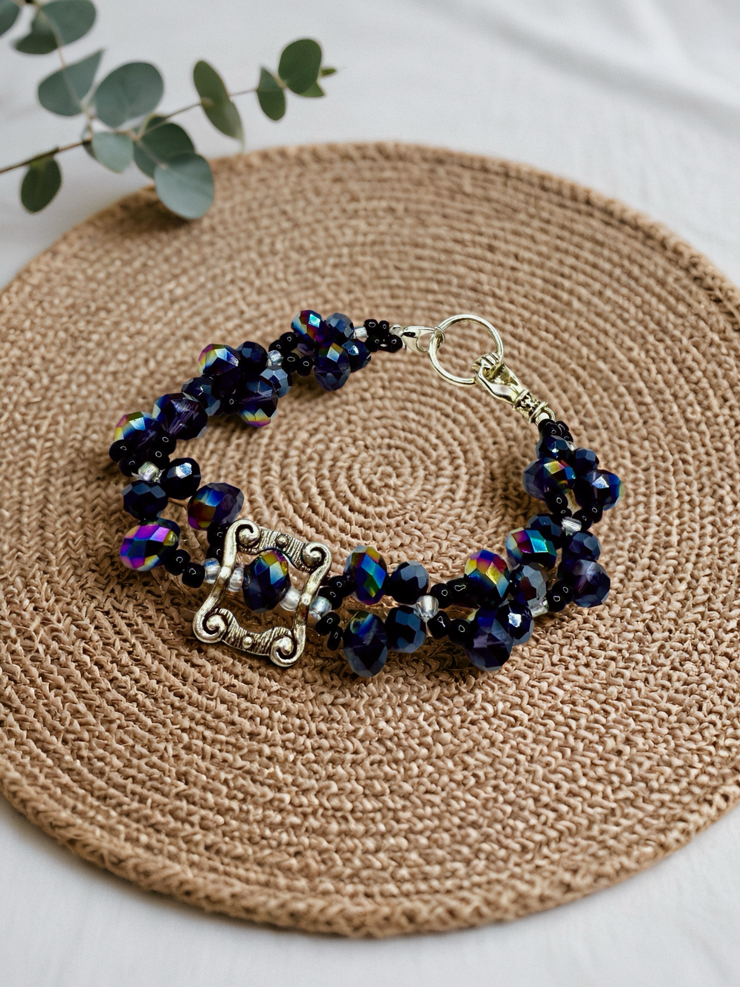Beauty in Black glass beads with antique hand charms