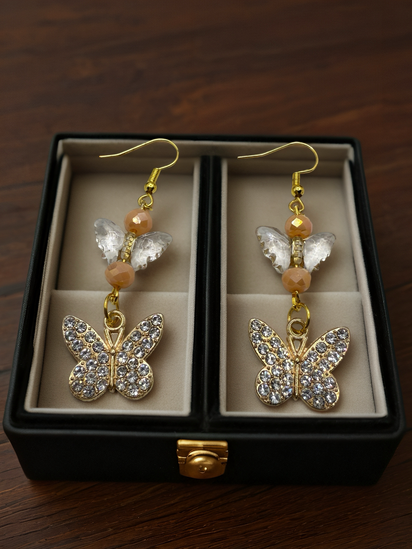 Golden butterfly hook earrings