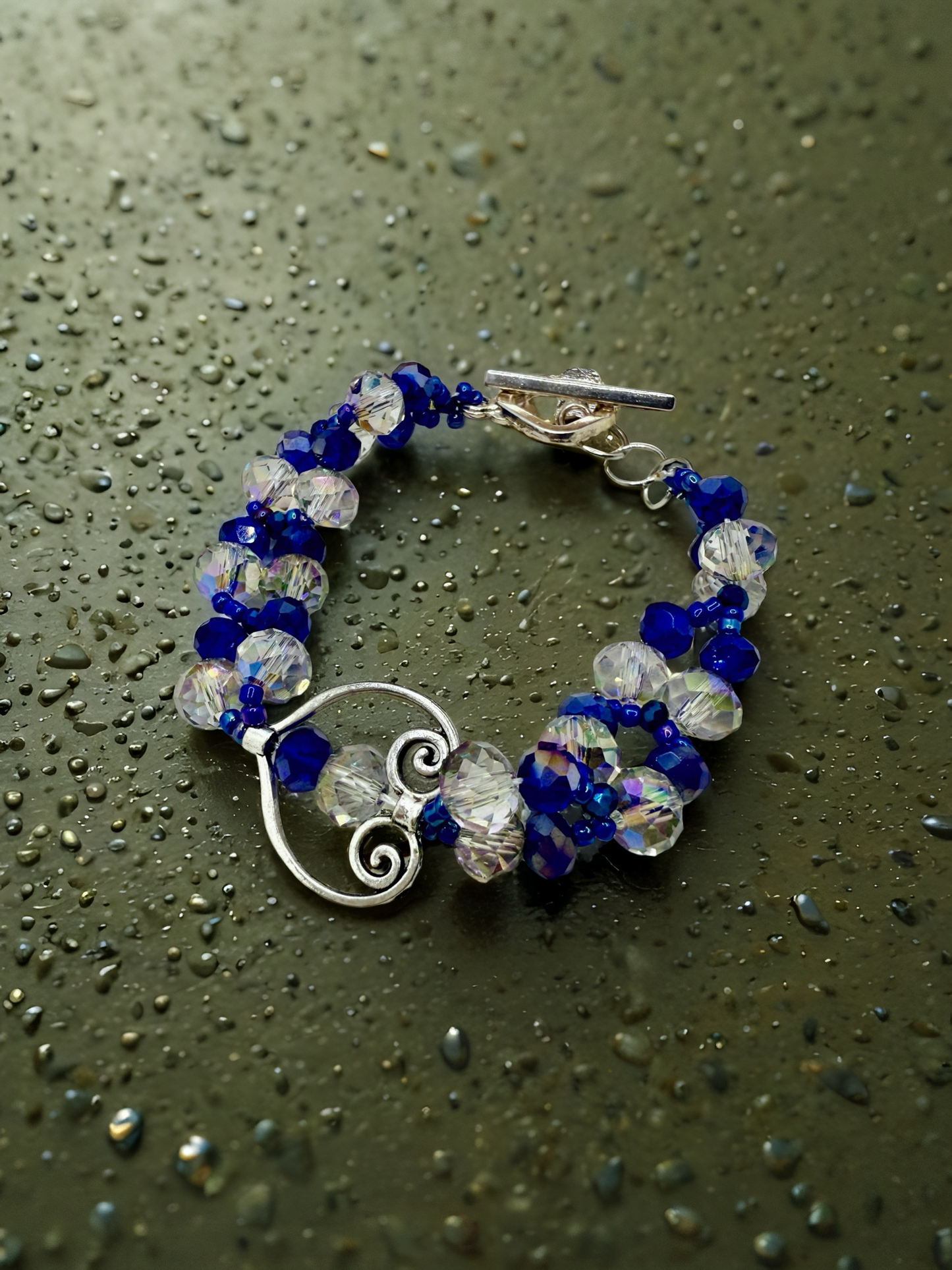 Crystal blue glass beads with antique hollow heart charms
