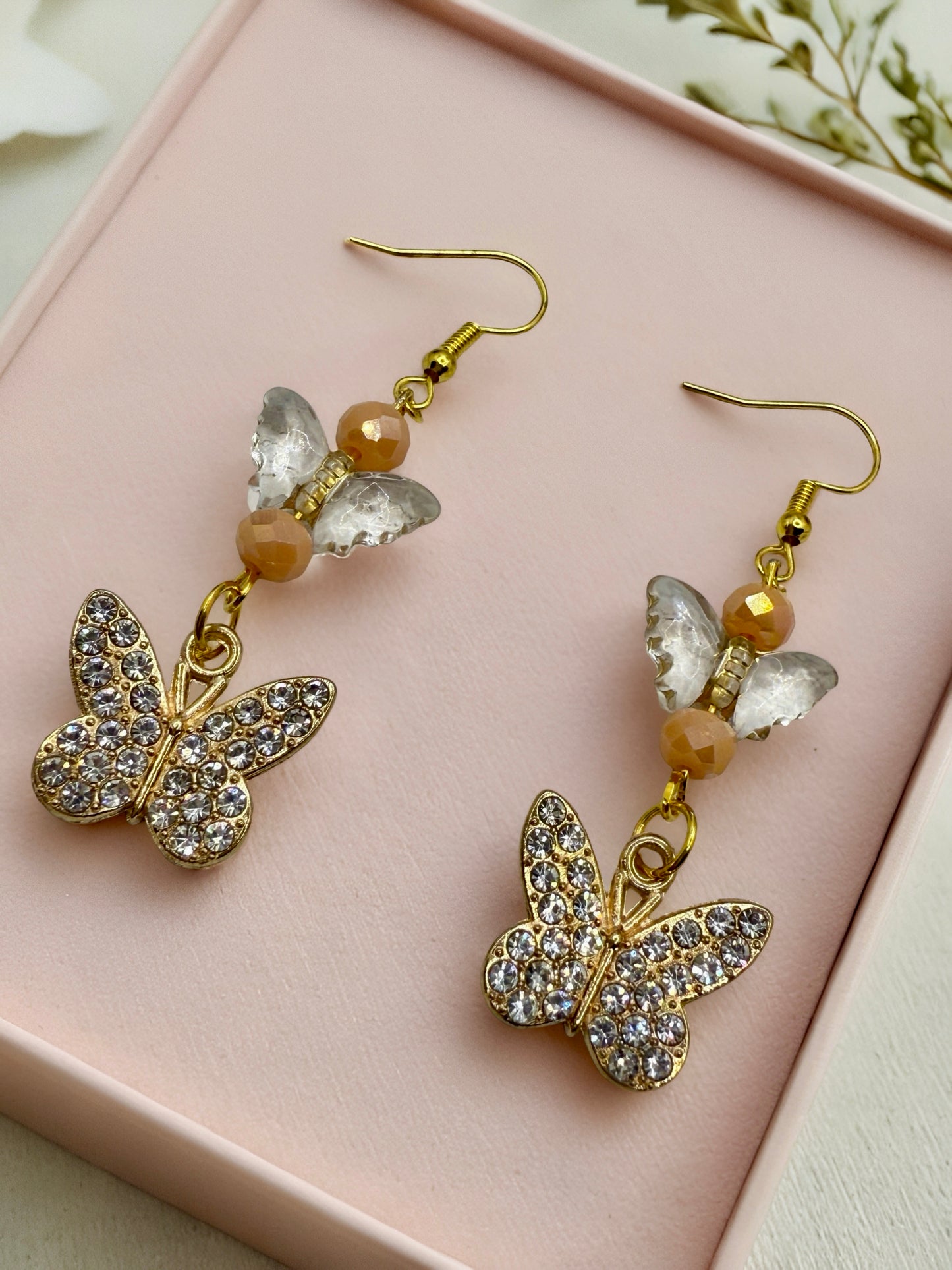 Golden butterfly hook earrings