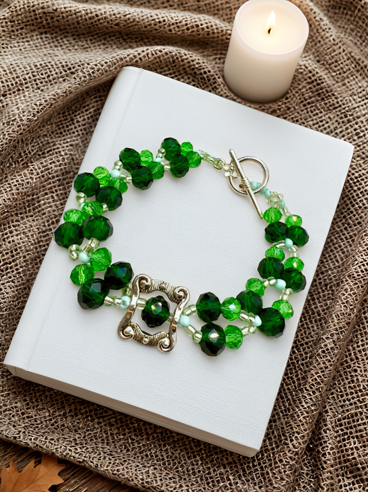 Green Faceted glass beads with antique hollow square charm