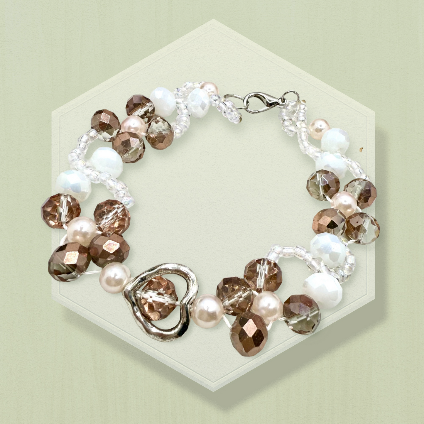Champagne in white glass beads with hollow heart charms