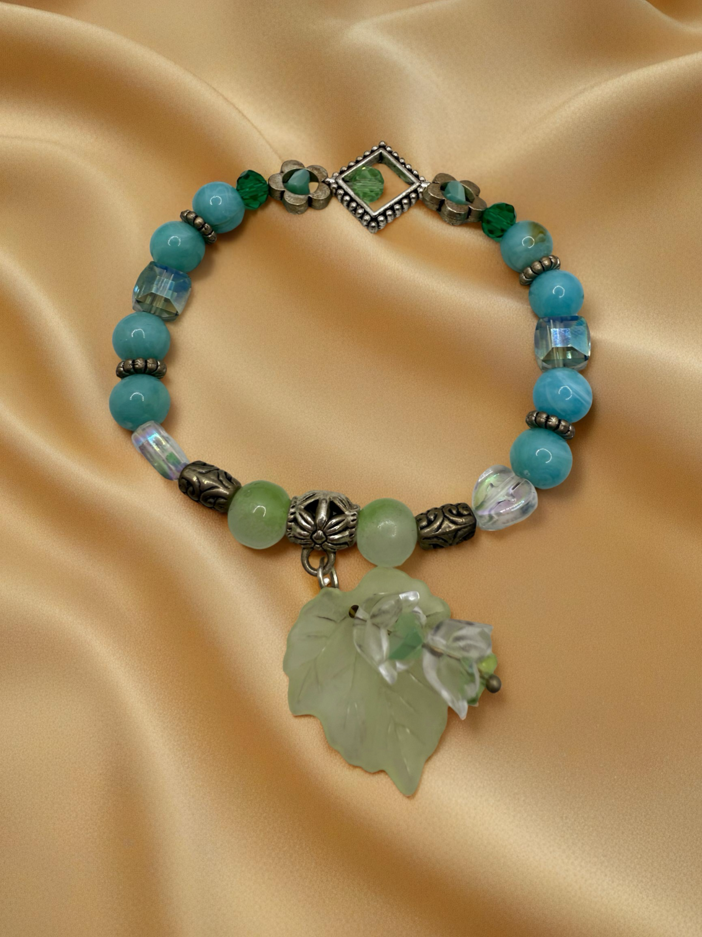 Turquoise flower and leaf charms beaded bracelet