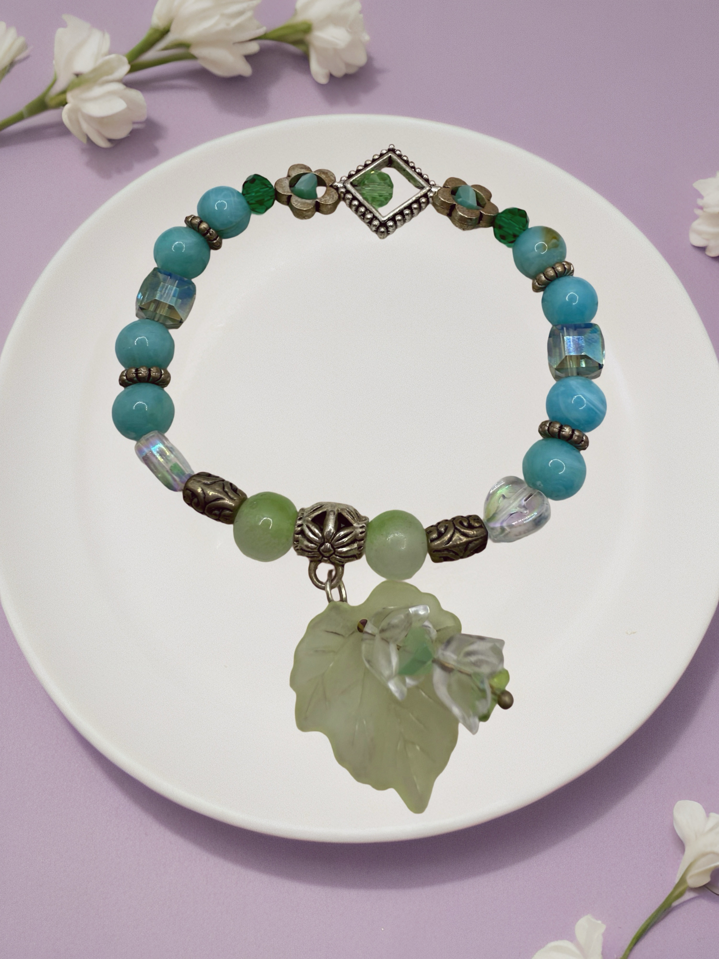 Turquoise flower and leaf charms beaded bracelet