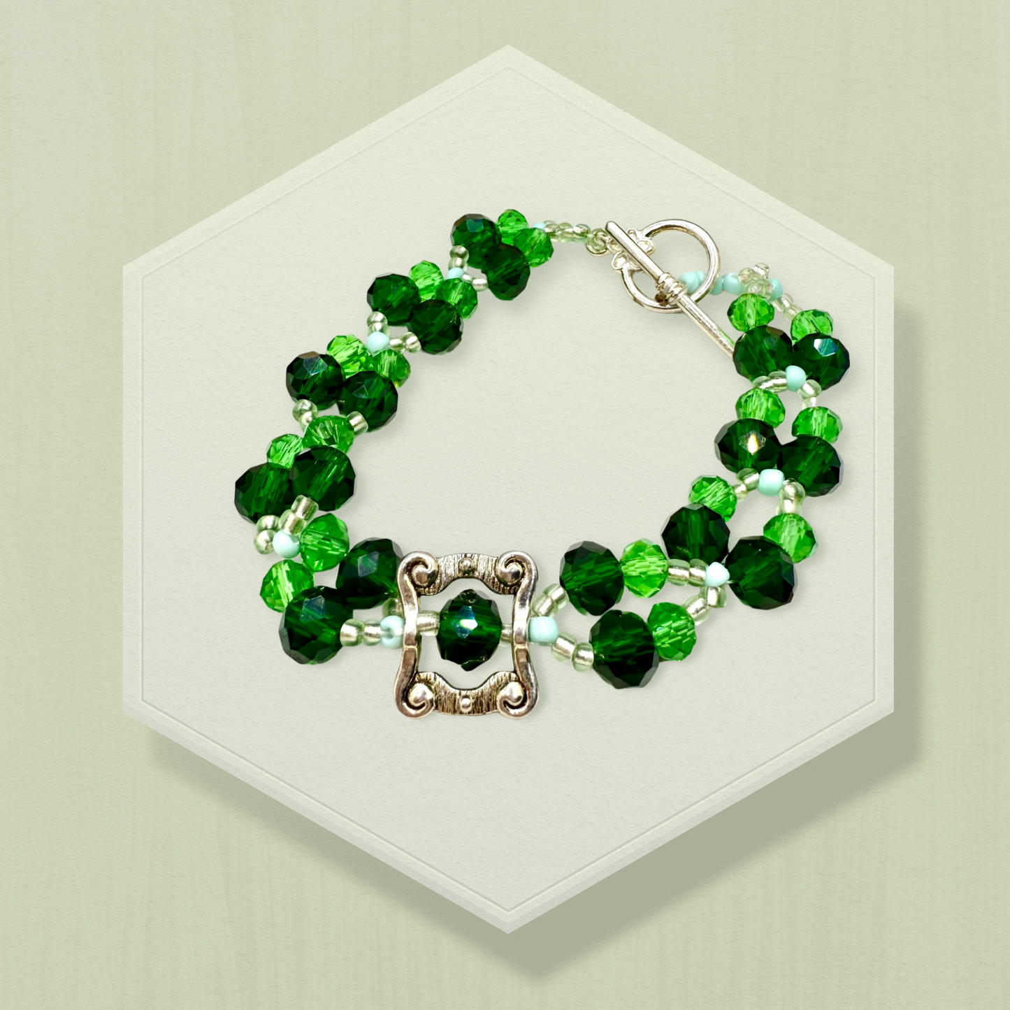 Green Faceted glass beads with antique hollow square charm