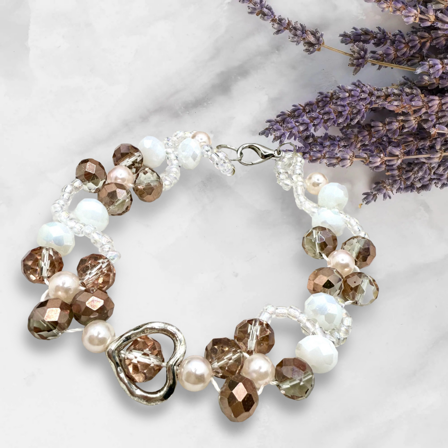 Champagne in white glass beads with hollow heart charms