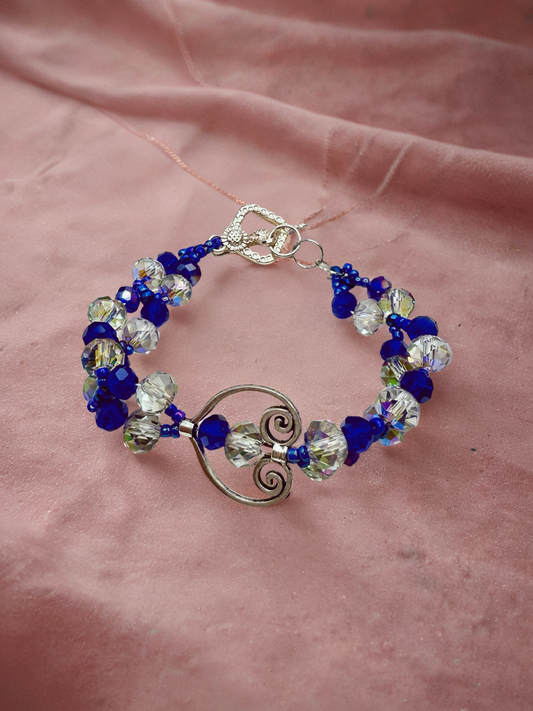 Crystal blue glass beads with antique hollow heart charms
