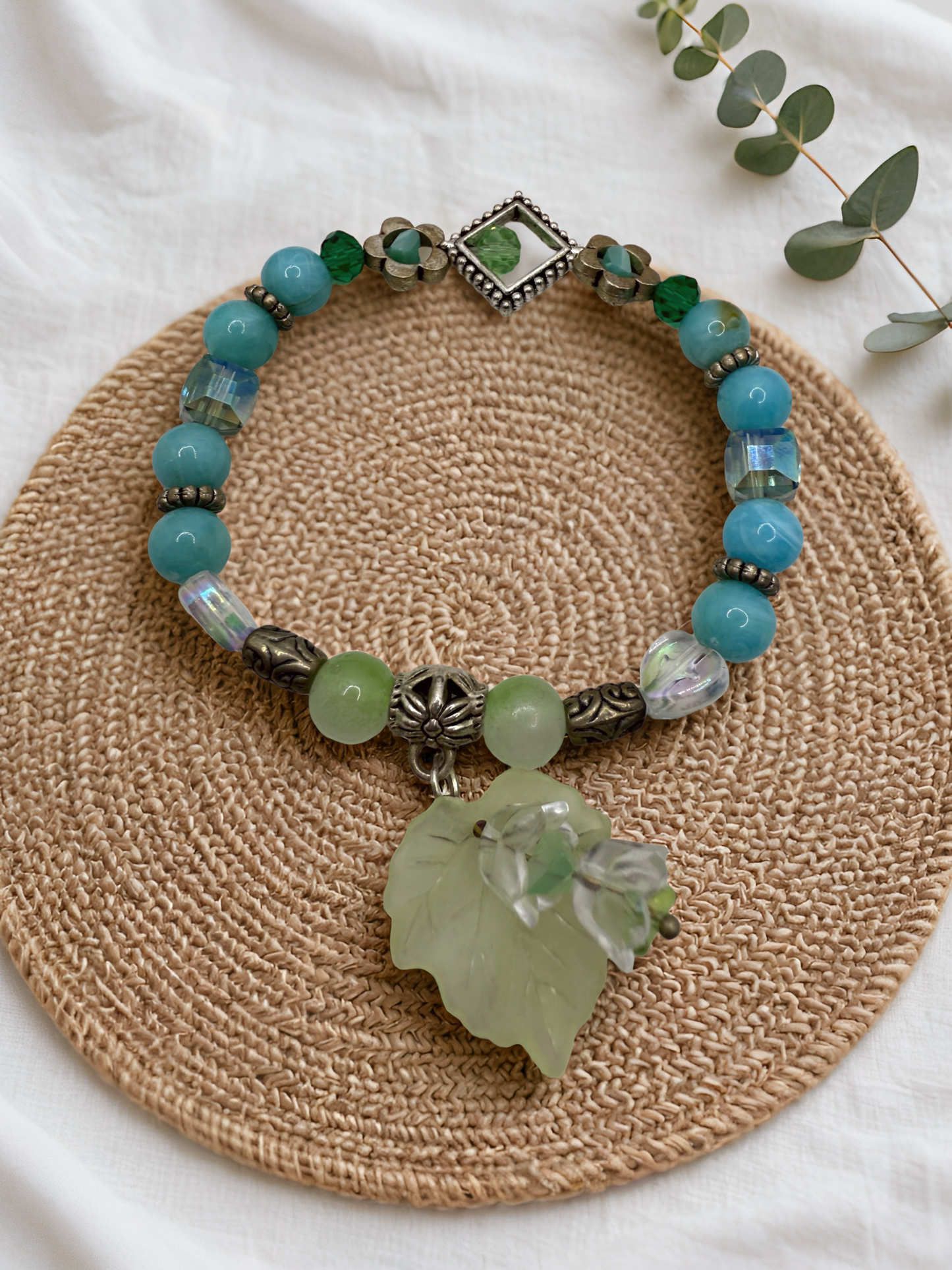 Turquoise flower and leaf charms beaded bracelet