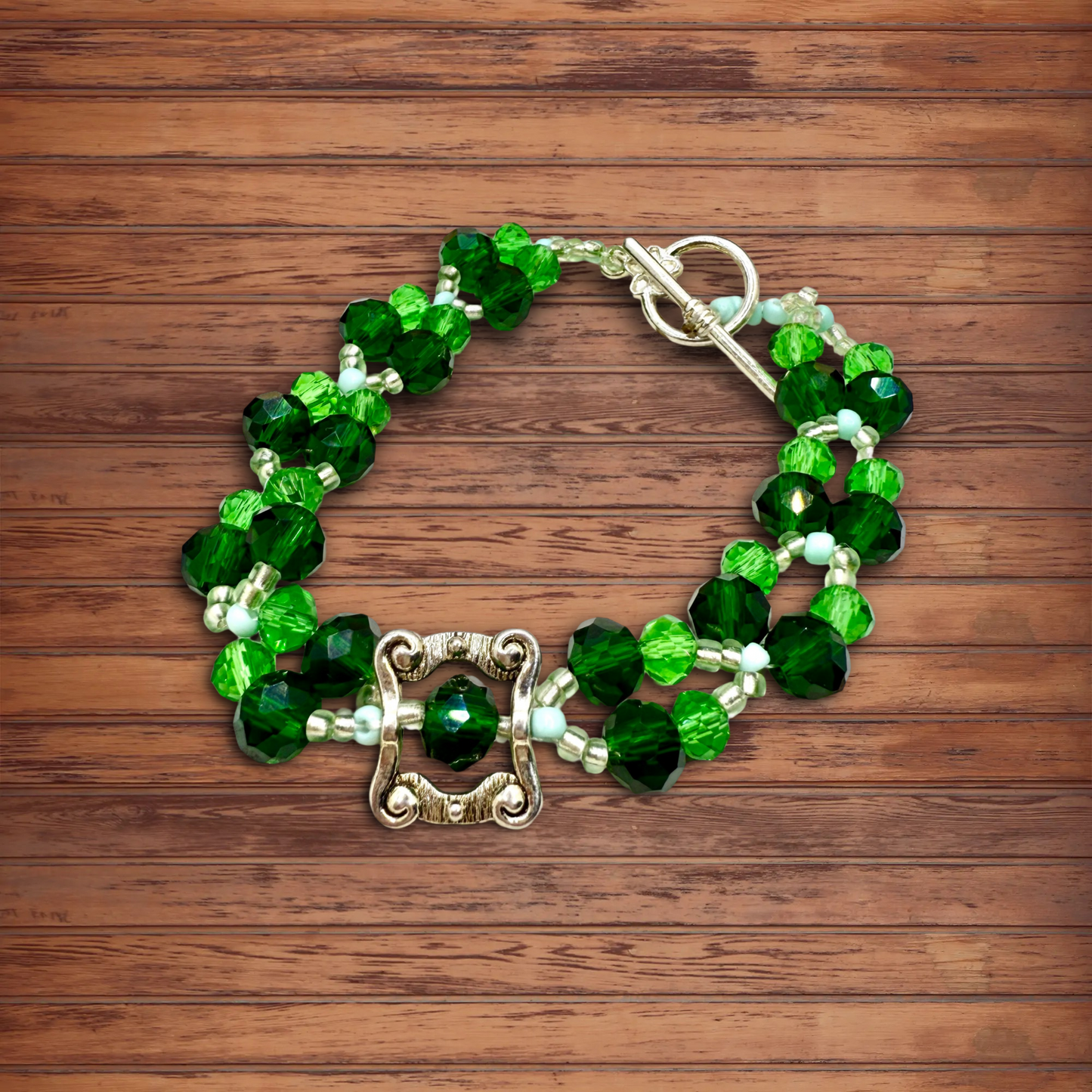 Green Faceted glass beads with antique hollow square charm