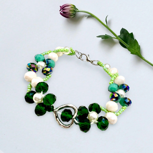 Hollow Silver Heart charm with Green and beige faceted glass beads